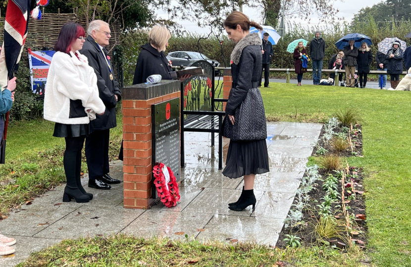 Aphra laying a wreath for Remembrance Sunday