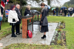 Aphra laying a wreath for Remembrance Sunday