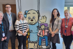 Aphra with Staff and Volunteers from Claire House